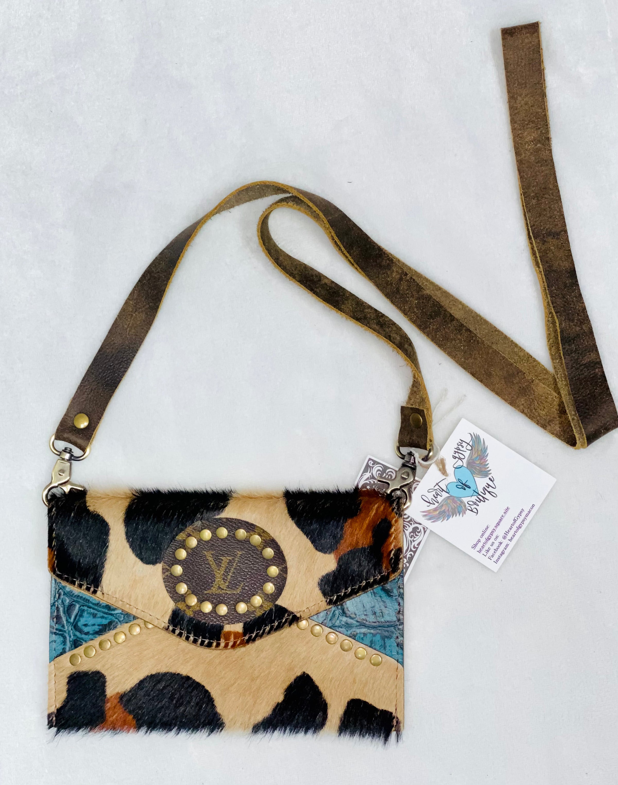 HC Repurposed LV Cowhide Duffle Bag – Shop Hannah Closet