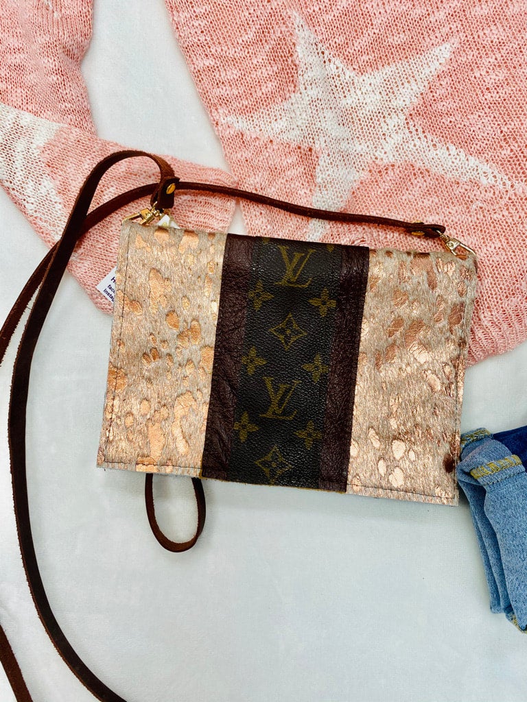 Leather wallet with cow print and upcycled Louis Vuitton